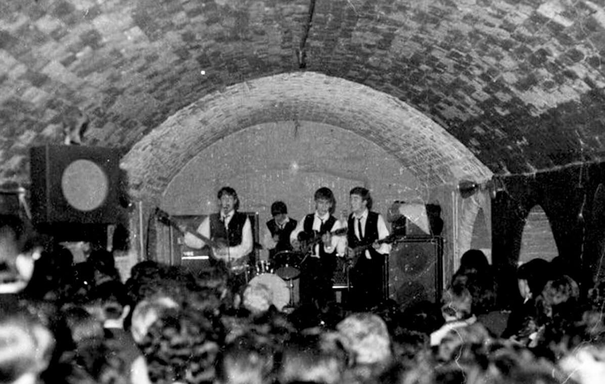The Beatles on stage in the Cavern Club in '63